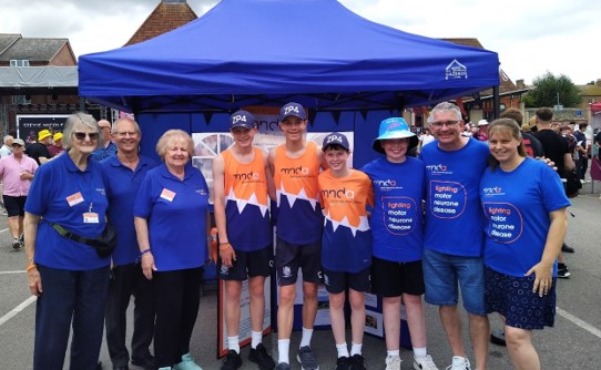 Picture of the Harris family with South and West Somerset Committee following walking fundraiser at Taunton