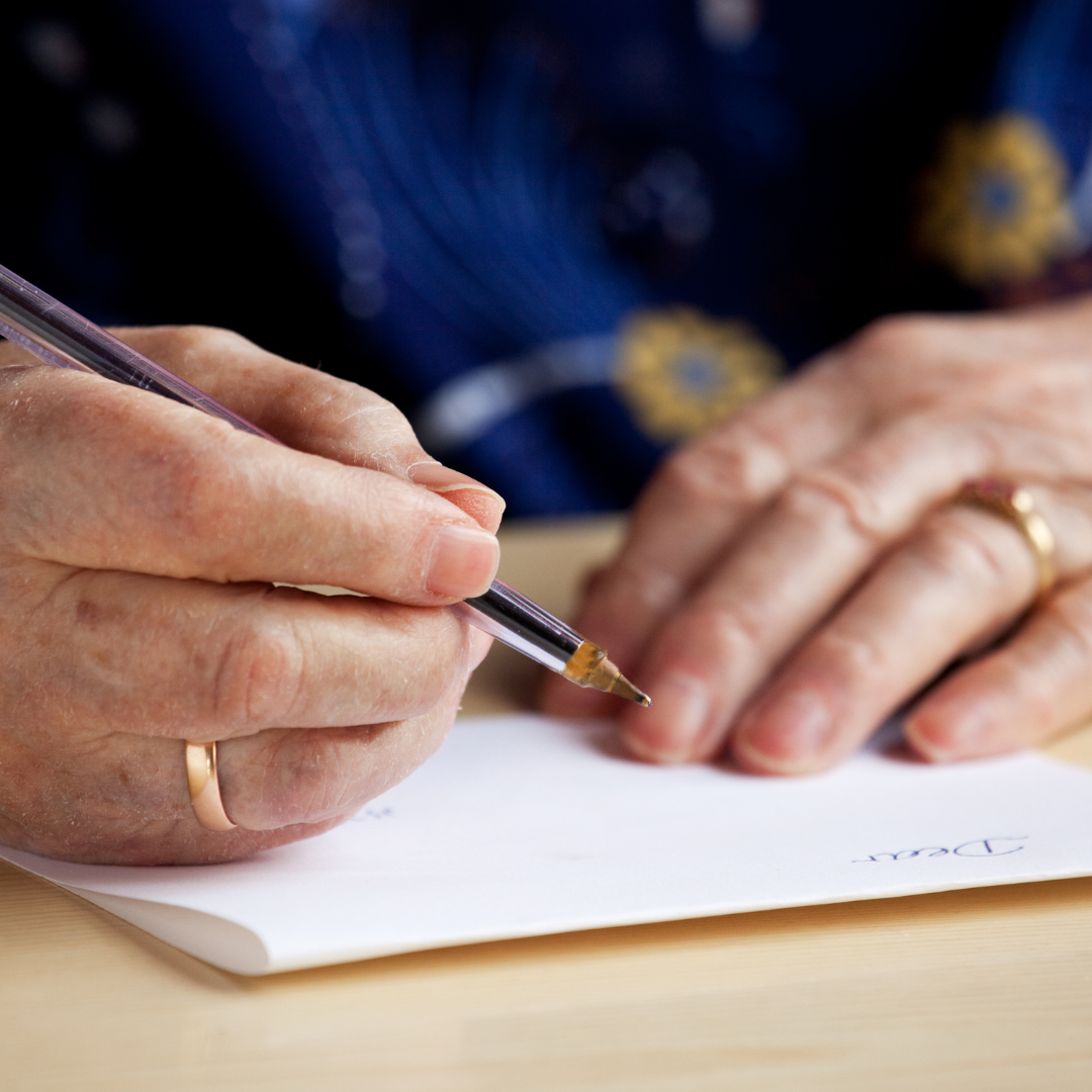 picture of someone writing 