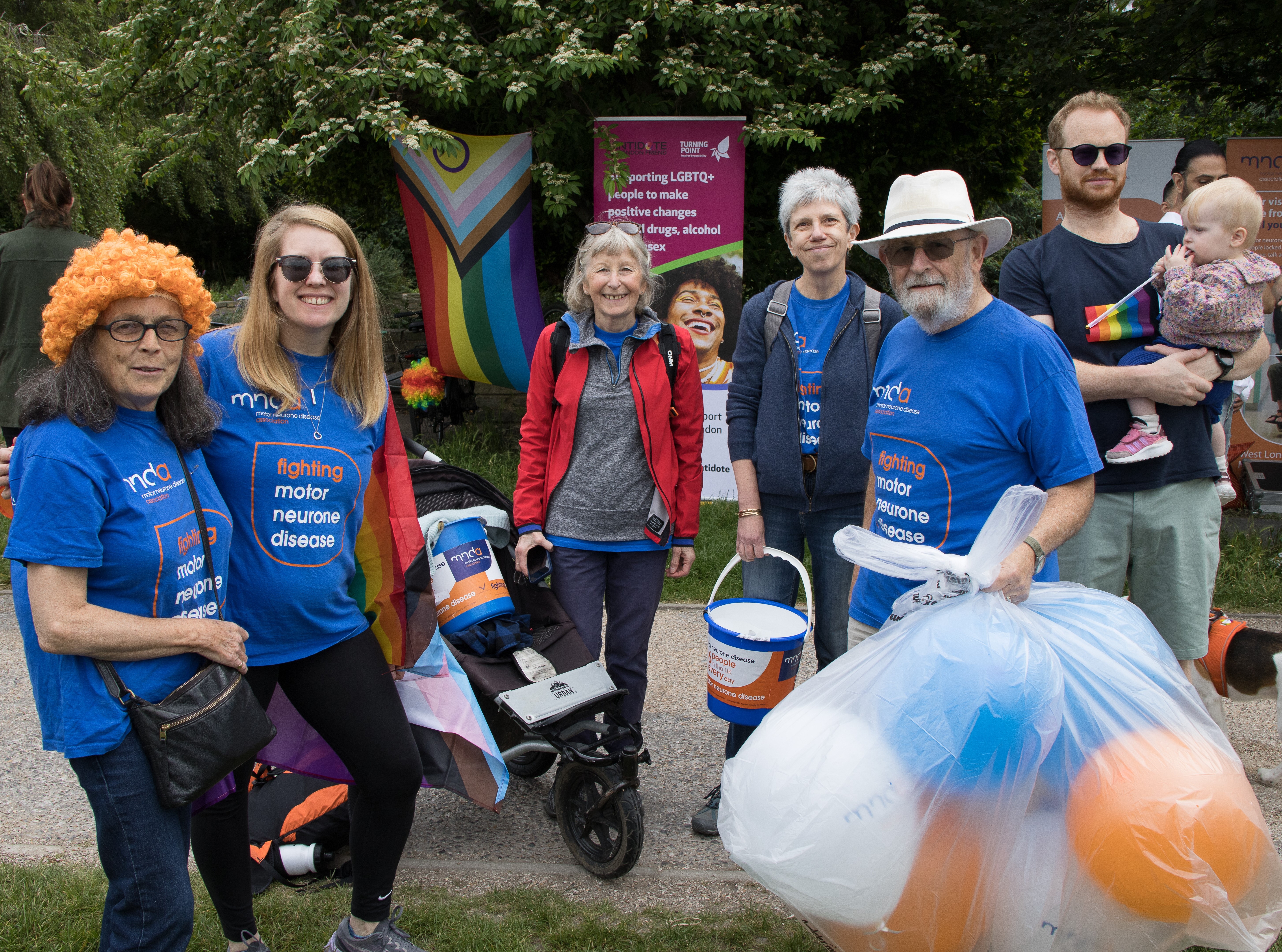 7 West London & Middlesex Branch Volunteers with balloons and buckets at the Branch's Walk Event