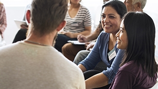 People talking at an event